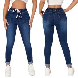 Jeans de mezclilla ajustados para mujer, estilo streetwear, novedad de primavera, con cordón elástico en la cintura y botones en los tobillos. - Product Image 1