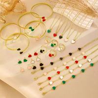 Ensemble de bijoux bohèmes pour femmes, best-seller, en alliage, avec fleurs - Cinq pièces, comprenant une bague, un bracelet, un collier et des boucles d'oreilles