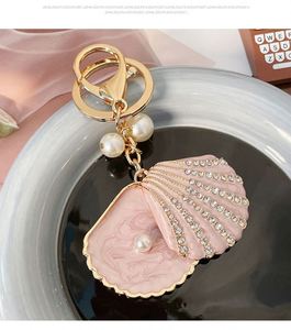 Porte-clés de luxe en coquillage perlé avec diamants, accessoire de mode pour sacs féminins, breloques de sac en coquillage marin - Product Image 4