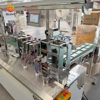 Machine intégrée de pliage et d'emballage de lingettes humides à quatre soudures latérales pour sachets individuels