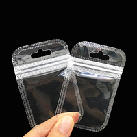 Vente en gros de sacs en plastique pour bijoux de fête petite pochette emballée pour cils sacs à bonbons avec cordon de serrage pochette d'emballage