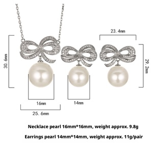 Ensemble de bijoux élégant et écologique en cuivre avec perles de coquillage de 14 mm, design nœud papillon, boucles d'oreilles et collier pour femmes, vente en gros - Product Image 2