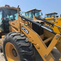 Excavatrice JCB4CX à haute stabilité, à réponse rapide, multi-outils et adaptable pour le défrichement de chantiers et les infrastructures rurales