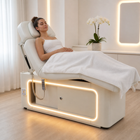 Lit de beauté électrique avec armoire de rangement, base à lumière d'ambiance LED, télécommande, hauteur réglable, lit de soin du visage pour salon de beauté et spa