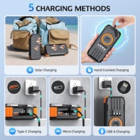 Batterie externe solaire transfrontalière haute capacité à manivelle avec micro USB intégré, charge sans fil à quatre fils et prise étanche