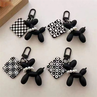 Porte-clés créatif HOT Kawaii en forme de chien ballon noir, perle, breloque pour sac de téléphone portable, pendentif, animal de dessin animé 3D en PVC, porte-clés en forme de chien ballon