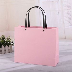 High-end New Arrival Customized Pink Color CMYK Printing Art <b>Paper</b> Shopping Bag for Clothing Packaging - Product Image 1