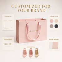 Sac en papier recyclable avec poignée en ruban carton ivoire et logo personnalisé doré, vente en gros pour emballage de luxe durable pour boutiques et détaillants