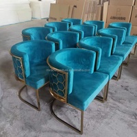 Chaise de salle à manger unique avec découpe laser au dos, chaise de salle à manger rembourrée en velours bleu marine pour restaurant