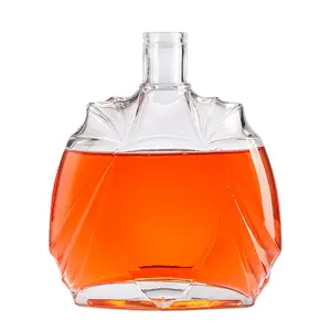 Bouteille en verre de grande capacité personnalisée haut de gamme bouteille en verre transparente en relief créative pour brandy whisky vodka rhum tequila