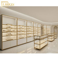 Muebles Modernos para Joyería de MDF Dorado con Vidrio Templado, Exhibidores de Pared para Joyería