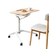 Bureau portable à roulettes avec design modulable, table de travail et d'étude réglable en hauteur pneumatiquement pour canapé