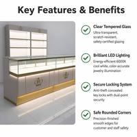 Comptoir de présentation de bijoux de luxe moderne avec éclairage LED, vitrine de vente au détail en verre noir sur mesure pour boutique de bijoux en centre commercial