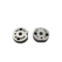 Vanne de commande d'injecteur de carburant diesel 501 #   10 # 5 # 31 # 7 # 28 # 29 #   Plaque de soupape Common Rail pour injecteur Denso