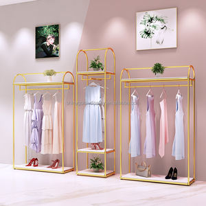 ที่กำหนดเองผู้หญิงขายปลีกเสื้อผ้ายืนแสดงสแตนเลสติดผนังชั้นวางเสื้อผ้าโลหะทองบูติกชั้นวาง<span class=keywords><strong>เสื้อผ้า</strong></span>สำหรับ<span class=keywords><strong>เสื้อผ้า</strong></span> - Product Image 2