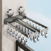Séchoir mural pliable à ventouse pour balcon, avec plusieurs pinces, design moderne et minimaliste, pour sous-vêtements