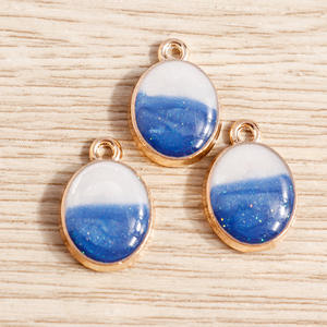 10 piezas por paquete: Nuevo colgante <span class=keywords><strong>de</strong></span> joyería <span class=keywords><strong>de</strong></span> <span class=keywords><strong>jade</strong></span> ovalado con efecto <span class=keywords><strong>de</strong></span> goteo <span class=keywords><strong>de</strong></span> aceite en aleación. - Product Image 2