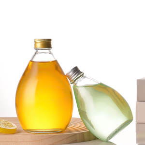 Venta Caliente Botellas de Vidrio Transparente Esmerilado Ecológicas y Reciclables en Forma de Gota de Agua de 100 ml, 280 ml, 350 ml, 500 ml con Tapa de Rosca para Jugo, Leche y Té - Product Image 4