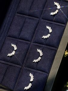 Xinfly Wholesale 18K Gold <b>Wing</b>-Shaped Diamond Stud <b>Earrings</b> 0.36ct Baguette and Round Diamonds <b>Wing</b> Shape Design - Product Image 4
