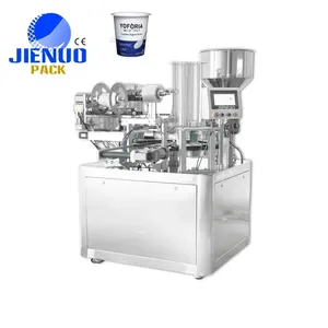 JIE NUO Automatic yogurt jelly milk juice tea rotating plastic cup filling and sealing machine