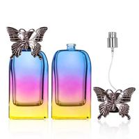Botol Parfum Kaca Pipih 100ml Grosir Tutup Kupu-kupu Isi Ulang Atomizer Permukaan Jernih Berkualitas Tinggi Cetak Sablon YUNMU