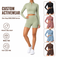 Ensemble de yoga 2 pièces pour femme : haut court à manches longues avec demi-zip et short cycliste taille haute – Idéal pour la gym et la course à pied