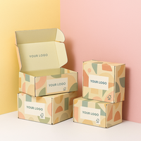 Carton de luxe personnalisé pour l'expédition postale de bijoux Boîte d'expédition Kraft pour vêtements Enveloppe de cadeau Boîtes d'emballage rose en papier d'expédition