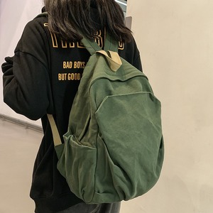 Mochila de lona deportiva informal estilo japonés <span class=keywords><strong>Retro</strong></span> al por mayor para hombres y mujeres mochilas escolares resistentes al desgaste para viajes universitarios moda - Product Image 1