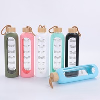 Bouteille d'eau portable transparente personnalisable de 550 ml et 1 L (32 oz) anti-fuite pour étudiants, avec manchon en silicone et couvercle en bambou