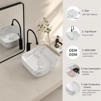 Lavabo de salle de bain en céramique avec finition en marbre blanc moderne personnalisé