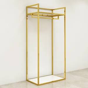 Soporte dorado brillante personalizado para ropa, estante de exhibición de ropa de Metal