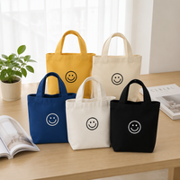 Sac fourre-tout en toile durable et écologique avec un design minimaliste, motif lettres, longue poignée, portable et pratique pour un usage quotidien