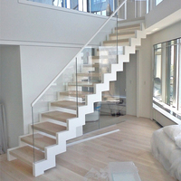 Escalier en zigzag à marches ouvertes en acier et bois avec garde-corps à câbles pour projets de rénovation résidentielle - Vente chaude