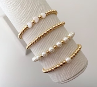 Venta al por mayor personalización 18K oro Acero inoxidable cuenta Mini perla Original perlas de agua dulce pulseras elásticas joyería para mujeres
