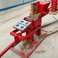 Machine manuelle écologique pour la fabrication de briques de terre emboîtables, machine à fabriquer des briques d'argile sans cuisson avec logo