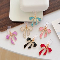 Breloques anti-poussière pour téléphone avec nœud mignon, pendentifs décoratifs en émail en forme de nœud pour port de charge USB-C, accessoires décoratifs