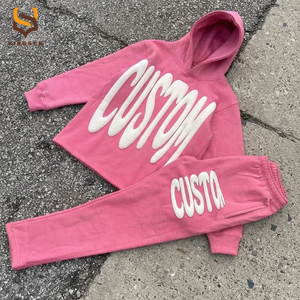 Conjunto Deportivo de Dos Piezas para Hombre, Diseño de Color Sólido, Sudadera Holgada con Capucha y Pantalones Deportivos Lisos con Estampado Puff - Product Image 1