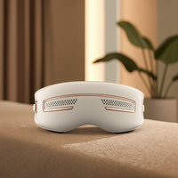 Masseur pour les yeux avec thérapie de refroidissement et de chauffage, 12 points de massage, température réglable, musique relaxante intégrée