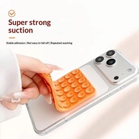Nouveaux produits 2026 : Support de téléphone portable pliable en silicone à double ventouse