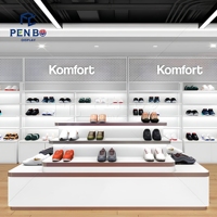 Conception d'intérieur de magasin de chaussures sur mesure, présentoir de chaussures pour la vente au détail, étagère avec éclairage LED, vitrine murale pour salle d'exposition de chaussures