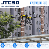 Drone de nettoyage haute pression UAV à jet d'eau de précision pour le nettoyage de fenêtres de grande hauteur, idéal pour les services d'entreprennages industriels