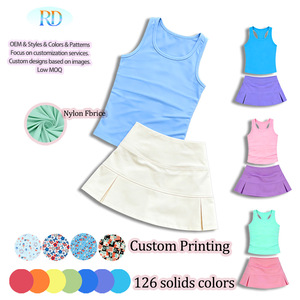 Conjunto de 2 piezas de nailon y elastano para mamá: Falda de tenis para bebé con pantalón corto interior y conjunto de camiseta sin mangas tipo racerback y falda plisada para uso diario. - Product Image 5