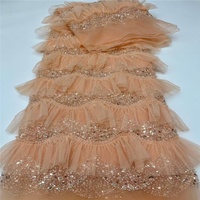 Nouveau style de tissu en maille africaine à volants et broderies en dentelle avec perles et paillettes faites à la main pour vêtements en polyester