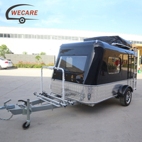 Remorque de camping légère à essieu unique Wecare avec tente de toit et porte-moto pour SUV, pick-up et 4x4