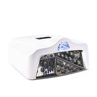 Lampe à LED UV blanche pour ongles avec intérieur réfléchissant bleu et boutons de minuterie numériques pour le séchage du vernis gel