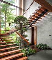 Escalier flottant de style américain avec poutre en acier dissimulée, marches en marbre, design d'escalier flottant