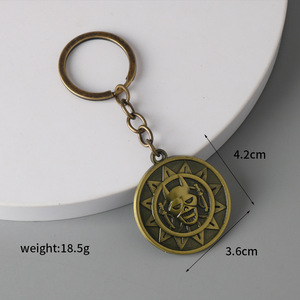 Carton phim hoạt hình sọ đầu Vòng cổ mặt dây chuyền cướp biển của Caribbean Vàng Keychain đồng xu Mặt dây chuyền móc chìa khóa trong số lượng lớn - Product Image 2