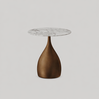 Table d'appoint de luxe à surface ronde en marbre et base en acier, style italien minimaliste et élégant pour villa