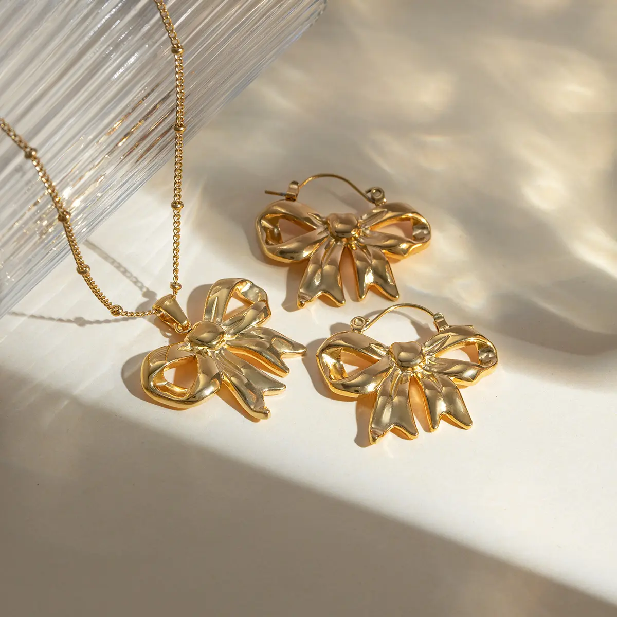 JoyEver conjunto de arco e brincos à prova d'água PVD 18k banhado a ouro em aço inoxidável conjuntos de joias da moda