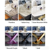 Table et chaises de salle à manger de style italien luxueux et épuré pour hôtel et villa, avec plateau en ardoise et structure en métal.